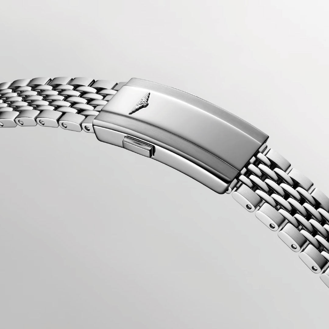A close-up of the silver metal bracelet and clasp with embossed triangular logo from the Longines Legend Diver Automatic 39mm Watch, set against a light gray background.