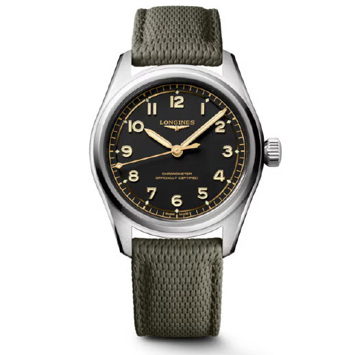 The Longines Spirit Pilot Automatic 39mm Watch features a black dial with gold-tone Arabic numerals and hands, a silver case, a textured green strap, and the Longines branding on the dial.