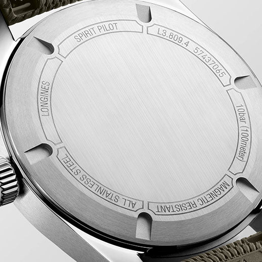 Close-up of the back of the Longines Spirit Pilot Automatic 39mm Watch by Longines, displaying engravings like "SPIRIT PILOT," "ALL STAINLESS STEEL," "WATER RESISTANT 10 bar (100 meter)," "LONGINES," and serial numbers.