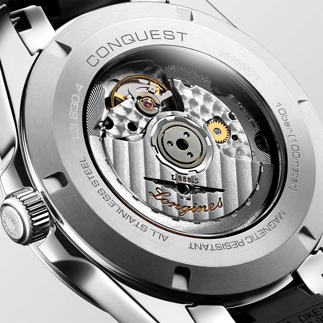 Close-up of the Longines Conquest Automatic 41mm Watch’s stainless steel caseback, displaying its Swiss automatic movement with engraved “L888.5” and “Longines,” plus detailed specs—ideal for everyday wear.