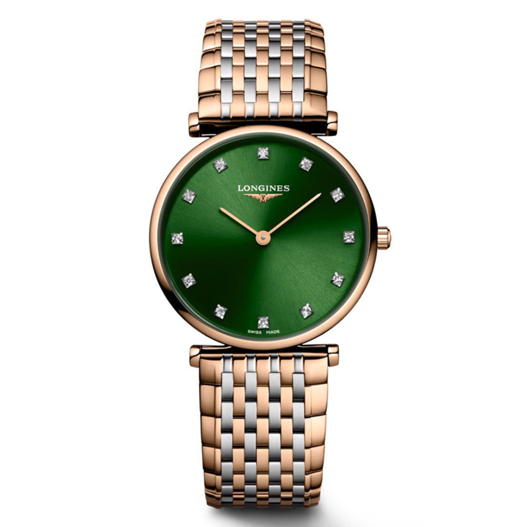The Longines La Grande Classique Quartz 29mm Watch is a luxury timepiece with a gold and silver band, round green dial, diamond hour markers, gold hands, and "Longines" and "La Grande Classique" displayed on the elegant face.