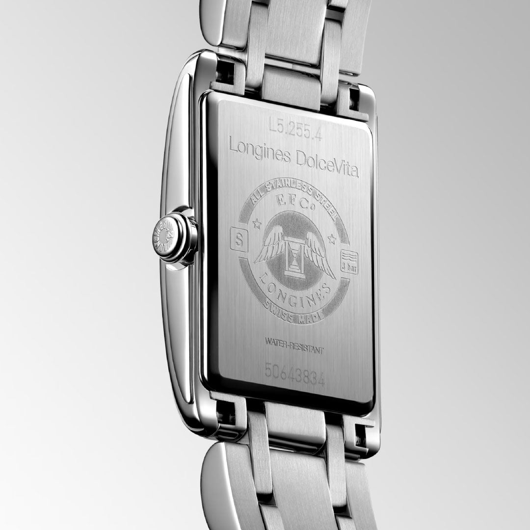 Close-up of the Longines Dolcevita Quartz 20.8 x 32mm watch's back, displaying engraved Longines branding, logo, model details, and "WATER-RESISTANT" on brushed stainless steel—a mark of refined luxury.