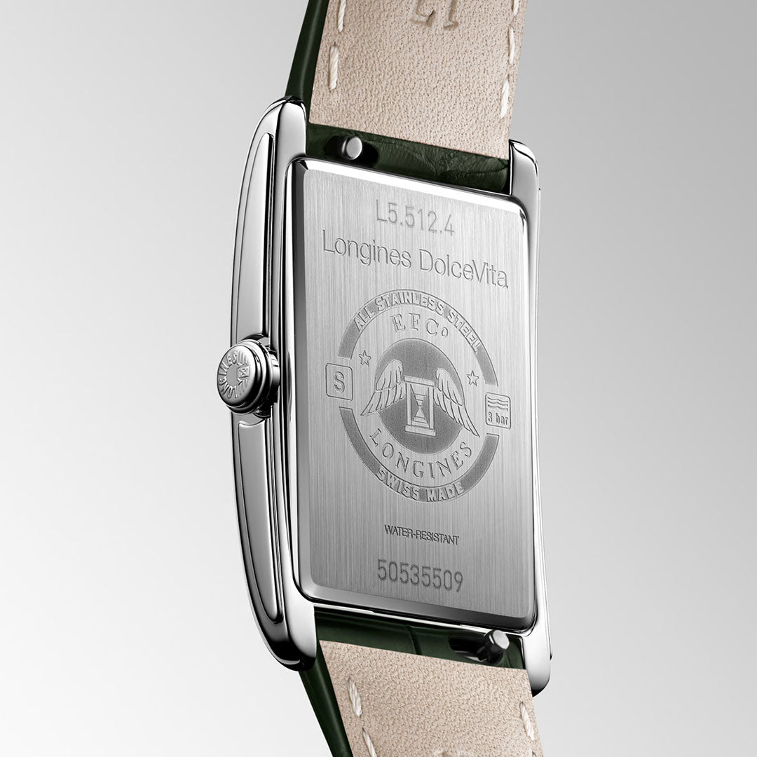 Close-up of the back of a Longines DolceVita Quartz 23.30 x 37mm watch, featuring engravings like model number, Longines logo, "STAINLESS STEEL," "WATER-RESISTANT," and serial number on an elegant alligator strap.