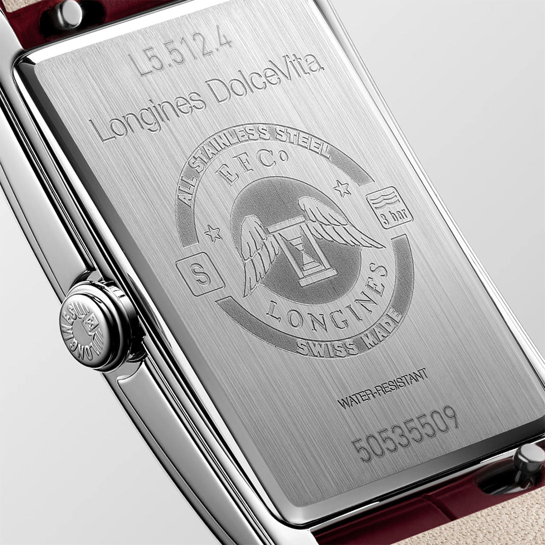 Close-up of the back of the Longines Dolcevita Quartz 23.3 x 37mm Watch, highlighting its timeless elegance with intricately engraved Longines branding, serial number, and specifications such as "All Stainless Steel," "Swiss Made," and "Water-Resistant." These exquisite details exemplify the renowned craftsmanship of Longines luxury watches.