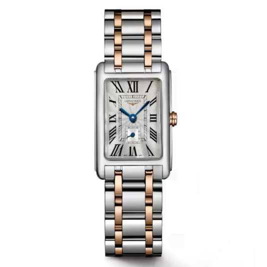 The Longines Dolcevita Quartz 20.8 x 32mm Watch features a rectangular case, silver and rose gold bracelet, white dial with Roman numerals, blue hands, and a date window at the bottom.