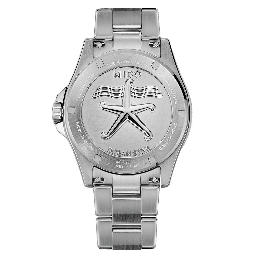 The back of the MIDO Ocean Star GMT Automatic 44mm Watch shows an engraved starfish, wave patterns, branding, and stainless steel bracelet with detailed engravings.