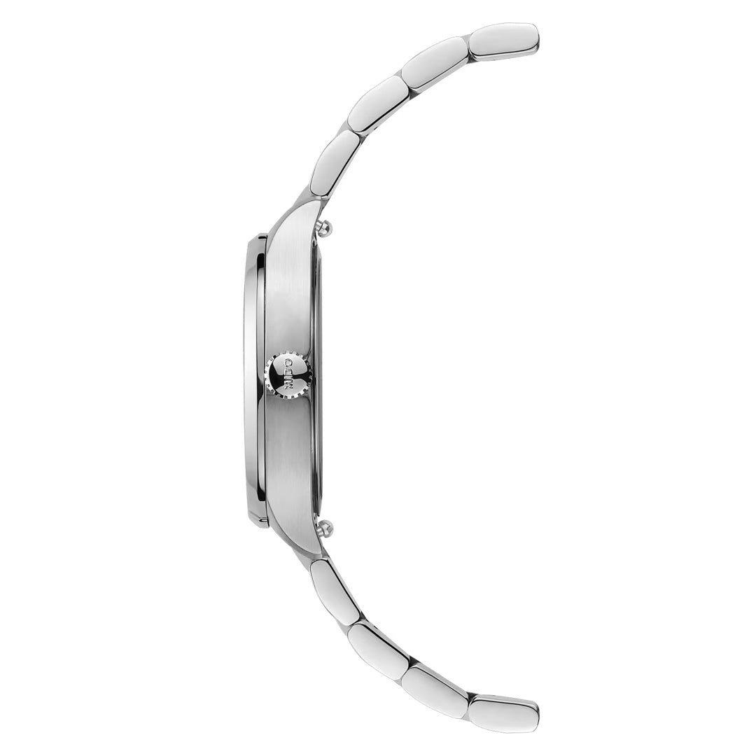 Side view of a silver TV-shaped watch with a metal band. The watch face and crown are visible, highlighting the slim and sleek profile of the MIDO Multifort TV Quartz 28mm Watch by MIDO.