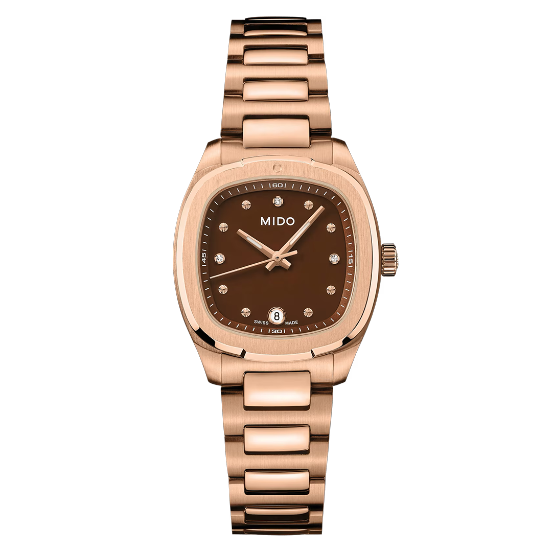 A rose gold MIDO Multifort TV Quartz 28mm Watch featuring a metallic bracelet, brown dial, diamond hour markers, and a date window at 6 o’clock.