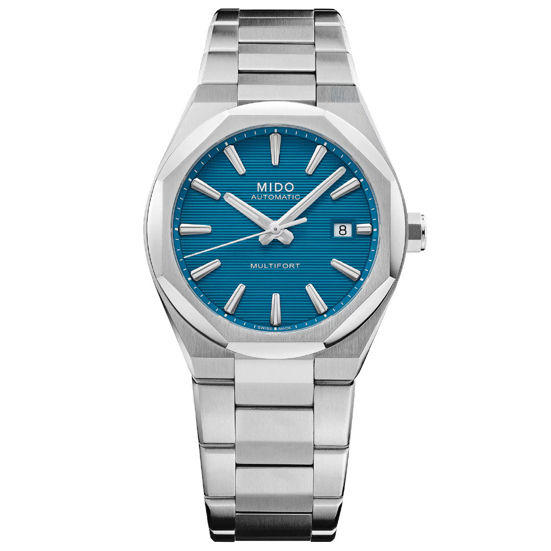 The MIDO Multifort 8 One Crown Automatic 40mm Watch features a silver stainless steel case, octagonal bezel, blue textured dial with silver markers and hands, a date window at 3 o'clock, and Swiss automatic movement.