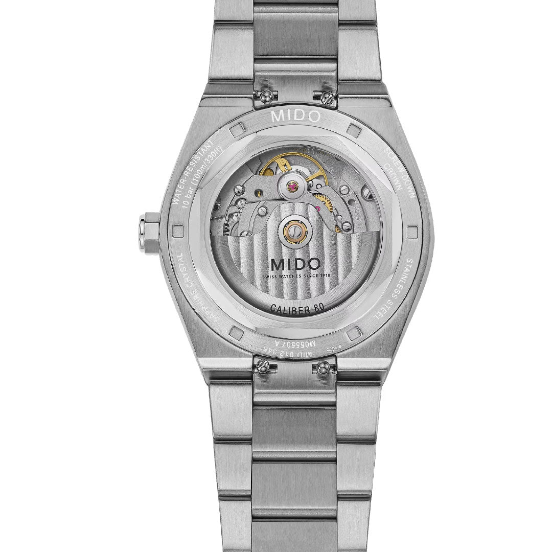 Back view of the MIDO Multifort 8 One Crown Automatic 40mm Watch with stainless steel bracelet, showing the transparent case back and exposed Swiss automatic movement with engraved details.