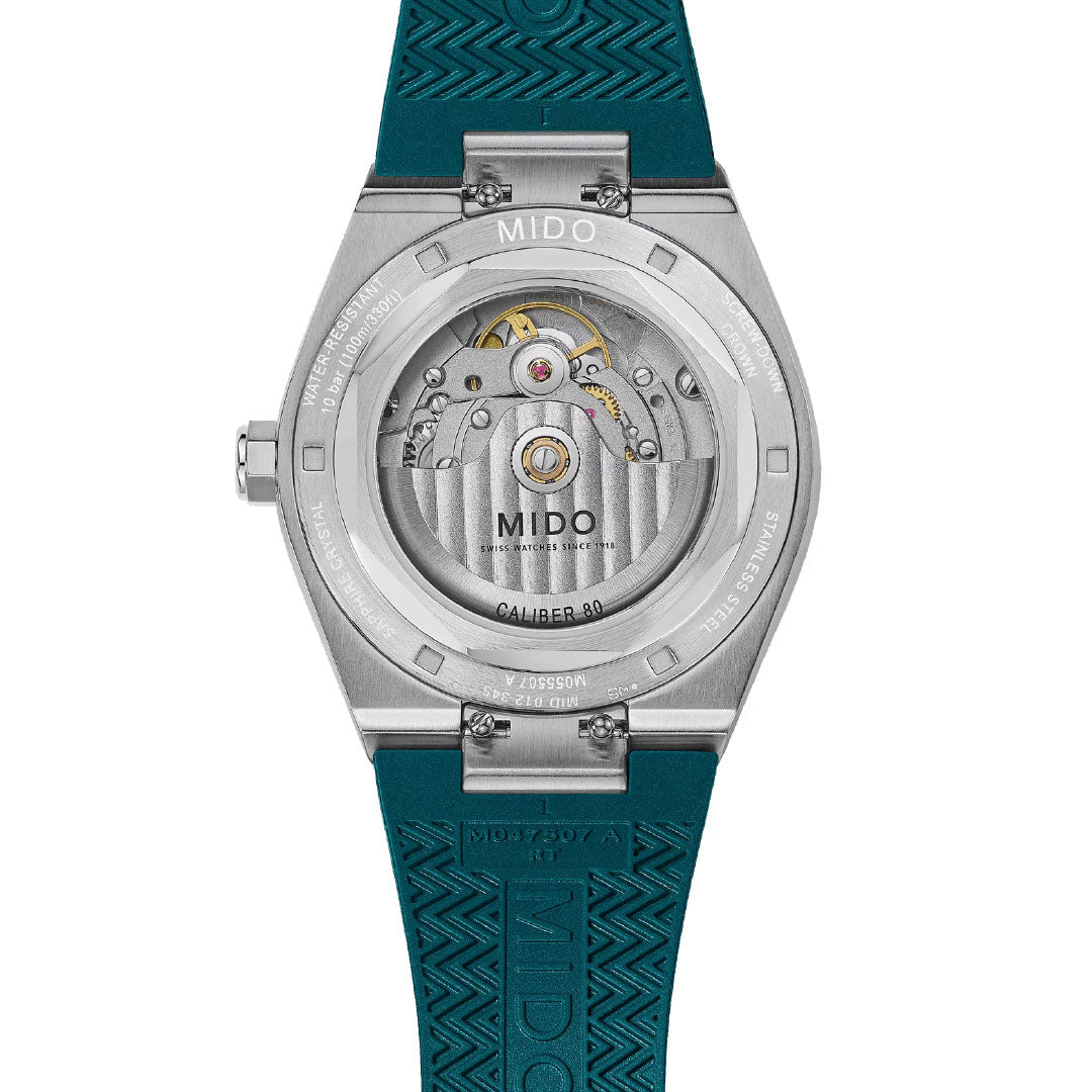 The back of the MIDO Multifort 8 One Crown Automatic 40mm Watch reveals its Swiss automatic movement, highlighted by a teal textured rubber strap, octagonal bezel, and engraved case details.