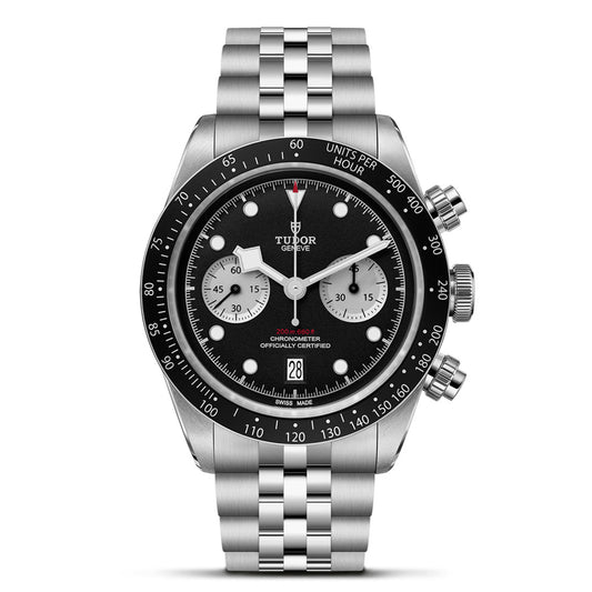 The TUDOR Black Bay Chrono sports watch combines elegance with athletic flair, featuring a stainless steel case, black dial with silver subdials, a date window at 6 o'clock, and a tachymetric bezel. Its bracelet showcases a polished and brushed metal finish.