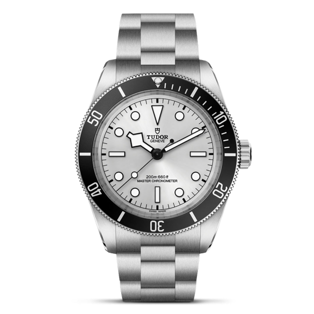 The TUDOR Black Bay 68 wristwatch boasts a white dial, black rotating bezel, luminous hour markers, a date window, "Tudor Geneve" branding, and a metal bracelet. It offers water resistance to 200 meters and embodies the essence of a Master Chronometer.