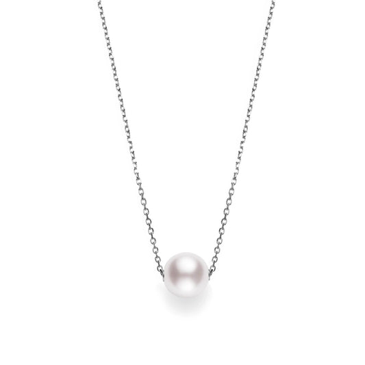 The Mikimoto 18k White Gold Akoya Cultured Pearl Pendant showcases a single Akoya cultured pearl elegantly suspended on a slender 18k white gold chain, set against a simple white background. The pearl takes center stage, offering an elegant and refined appearance.