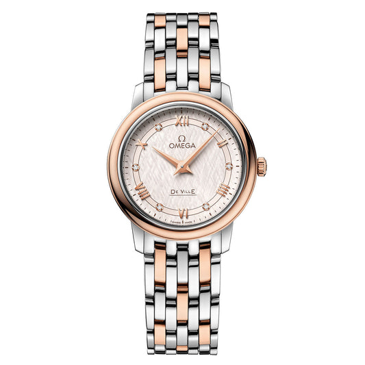 Discover the OMEGA De Ville Prestige Quartz 27.4mm Watch, a hallmark of luxury from OMEGA. This stunning timepiece features a sophisticated silver and rose gold link bracelet paired with an intricately textured silver dial, highlighted by gold-plated Roman numerals. Admire the graceful rose gold hour markers and the distinctive Omega logo.
