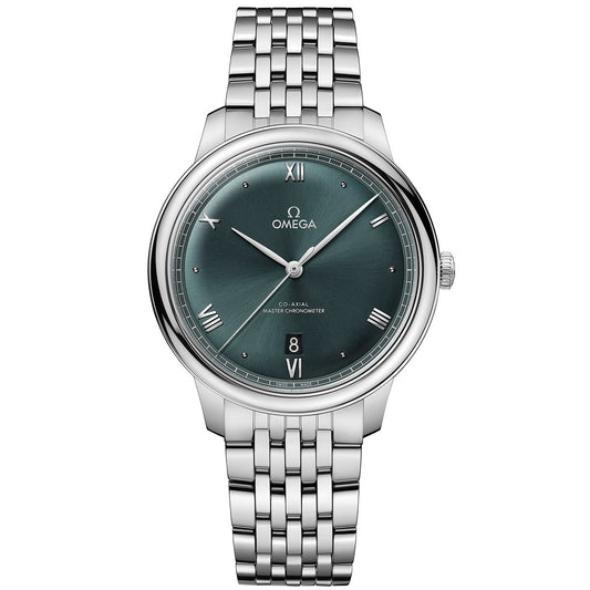 The OMEGA De Ville Prestige Co-Axial Master Chronometer 40mm Watch is a silver wristwatch with a green dial featuring Roman numerals, a date display at 6 o'clock, and an elegant stainless steel bracelet. The sophisticated watch hands enhance its timeless design, and as a Master Chronometer, it offers unparalleled precision.