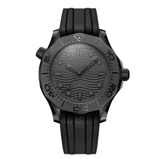 The OMEGA Seamaster Diver 300M Co-Axial Master Chronometer 43.5mm Watch in black features a textured wave-pattern dial. It is complemented by a black ceramic bezel with minute markers and comes with a rubber strap. Powered by the Co-Axial Master Chronometer Calibre 8806, this watch ensures water resistance up to 300 meters.