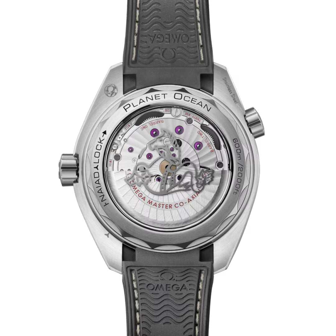 The image displays the back of the OMEGA Seamaster Planet Ocean 600M Co-Axial Master Chronometer 43.5mm Watch, revealing the intricate Calibre 8900 movement through a transparent case. The metal case is engraved with "Omega Master Co-Axial" and "60 bar/2000 ft," paired with a sleek black strap.