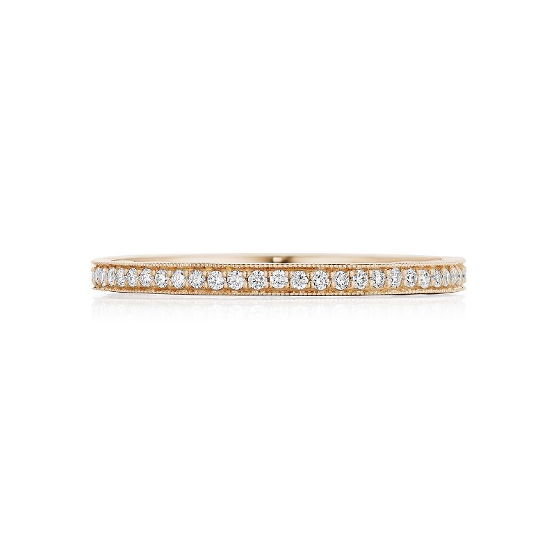 A Tacori Coastal Crescent 14K Rose Gold Round Brilliant Pavé Diamond Anniversary Ring, with pave-set diamonds forming a continuous sparkling line, embodies the elegance of Coastal Crescent and is beautifully displayed against a plain white background.