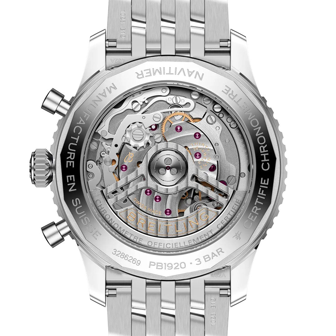 Close-up of the back of a Breitling Navitimer B19 Chronograph 43 Perpetual Calendar showing its intricate mechanical movement, visible gears and jewels through a transparent case, engraved edge, and attached metal bracelet.