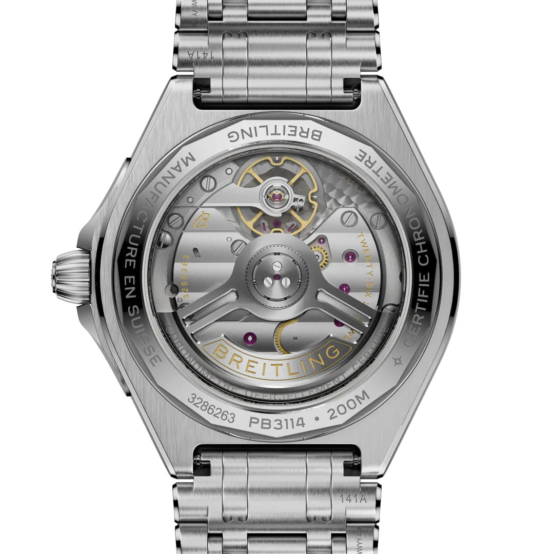 Close-up of the back of the Breitling Chronomat B31 Automatic 40, with its mechanical movement visible through a transparent case back, showing the metal bracelet and engraved details around the case.