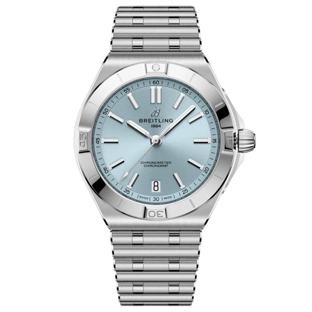 The BREITLING Chronomat B31 Automatic 40 is a stainless steel sports watch with a light blue dial, silver hour markers, date at 6 o’clock, COSC-certified automatic movement, and a silver link bracelet. The face reads "Breitling 1884 Chronometer Chronomat.