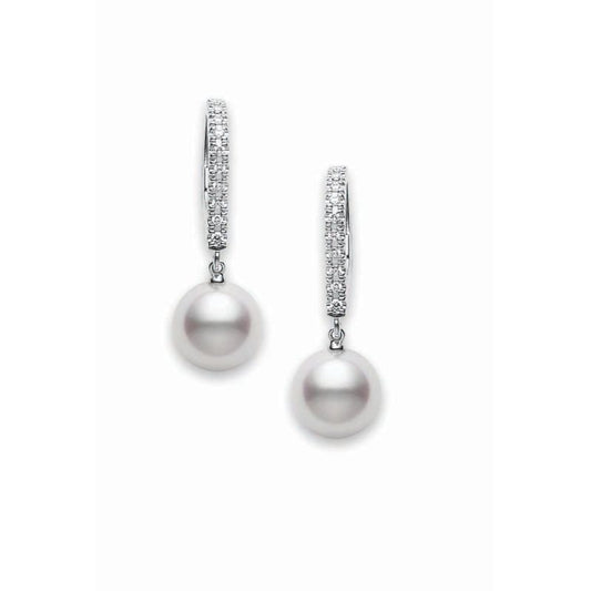Discover the Mikimoto Classic Elegance earrings, a sophisticated pair featuring Akoya cultured pearls gracefully suspended from 18K yellow gold leverback drops. Each earring is adorned with delicate diamond accents, embodying minimalist charm and refinement.
