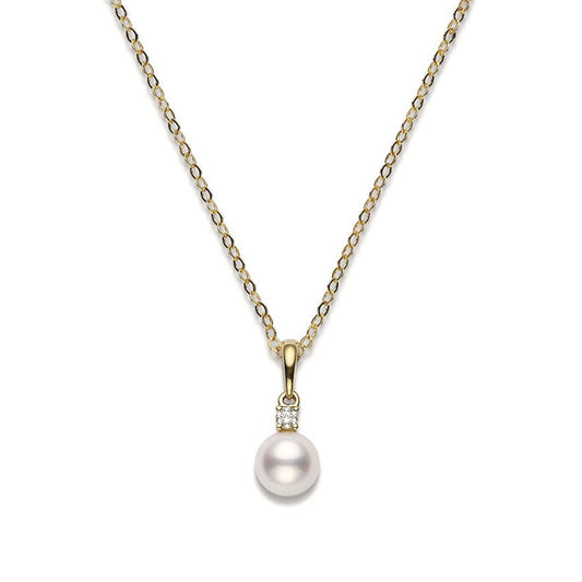 The Mikimoto 18K Yellow Gold Diamond with Akoya Cultured Pearl Necklace Pendant showcases a refined design, featuring a lustrous Akoya cultured pearl adorned with a small diamond accent, all set in exquisite 18K yellow gold, highlighting simplicity and elegance.
