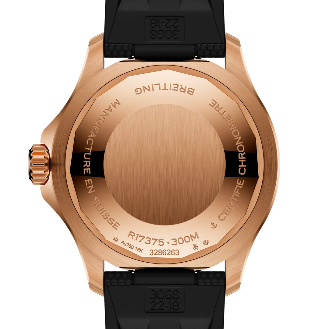 Rear image of the BREITLING Superocean Automatic 42 by Breitling, featuring a rose gold case, black strap, and engraved details including the model number R17375, “MANUFACTURE EN SUISSE,” 18K gold mark, and 300M water resistance—signature elements of this renowned dive watch.
