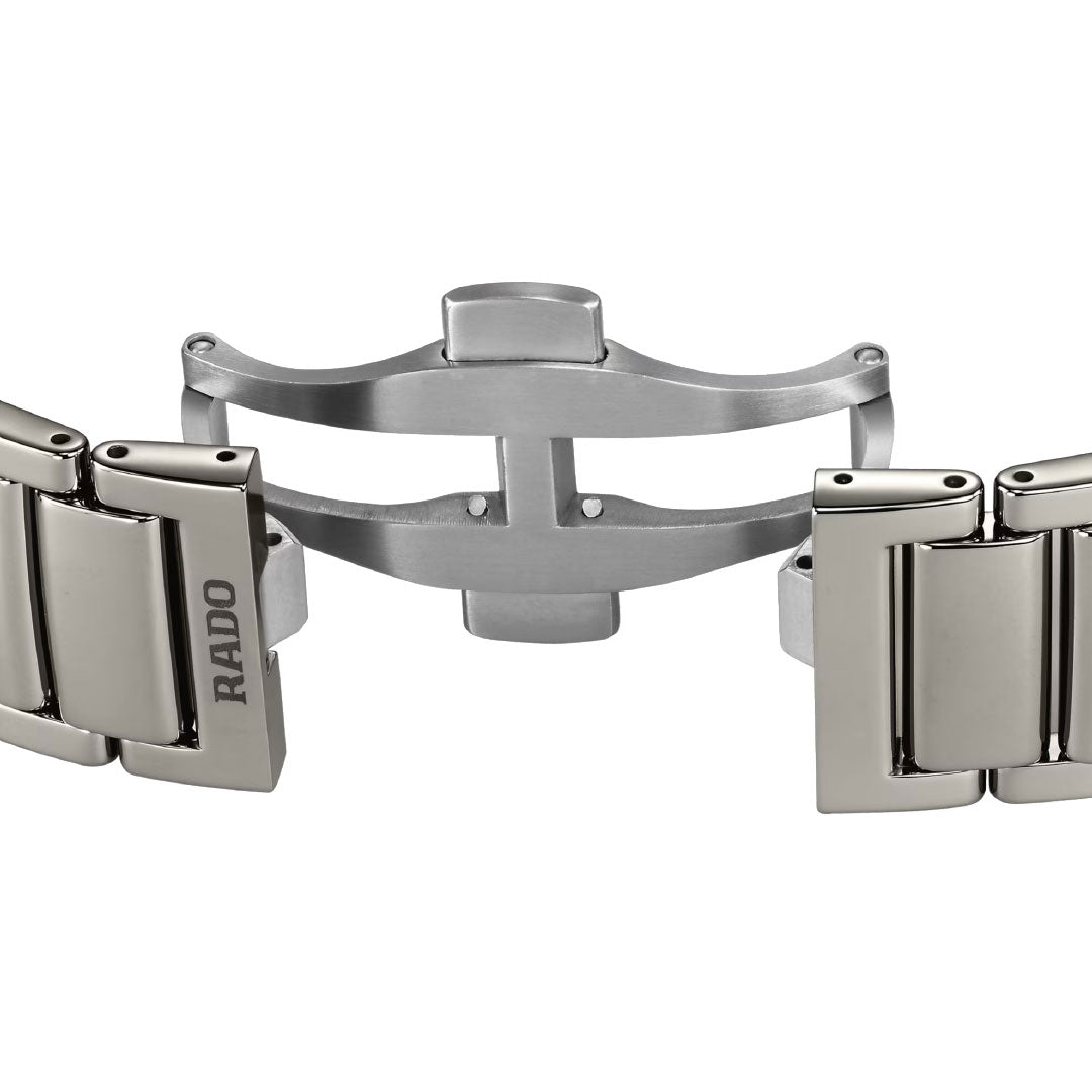 A stainless steel RADO clasp, shown open with metal links, perfectly complements your Rado True Square Automatic Open Heart Sparkling 38mm Watch.