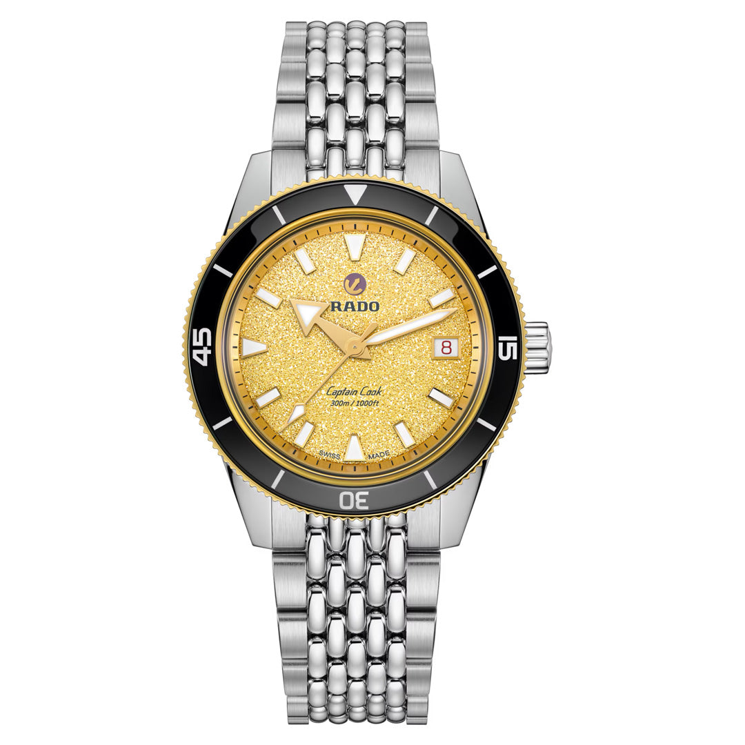 Introducing the RADO Captain Cook Automatic 39mm Watch: this elegant wristwatch by RADO showcases a striking yellow textured dial with silver hour markers, a date window at 3 o’clock, a refined black ceramic bezel, and a timeless silver metal bracelet.
