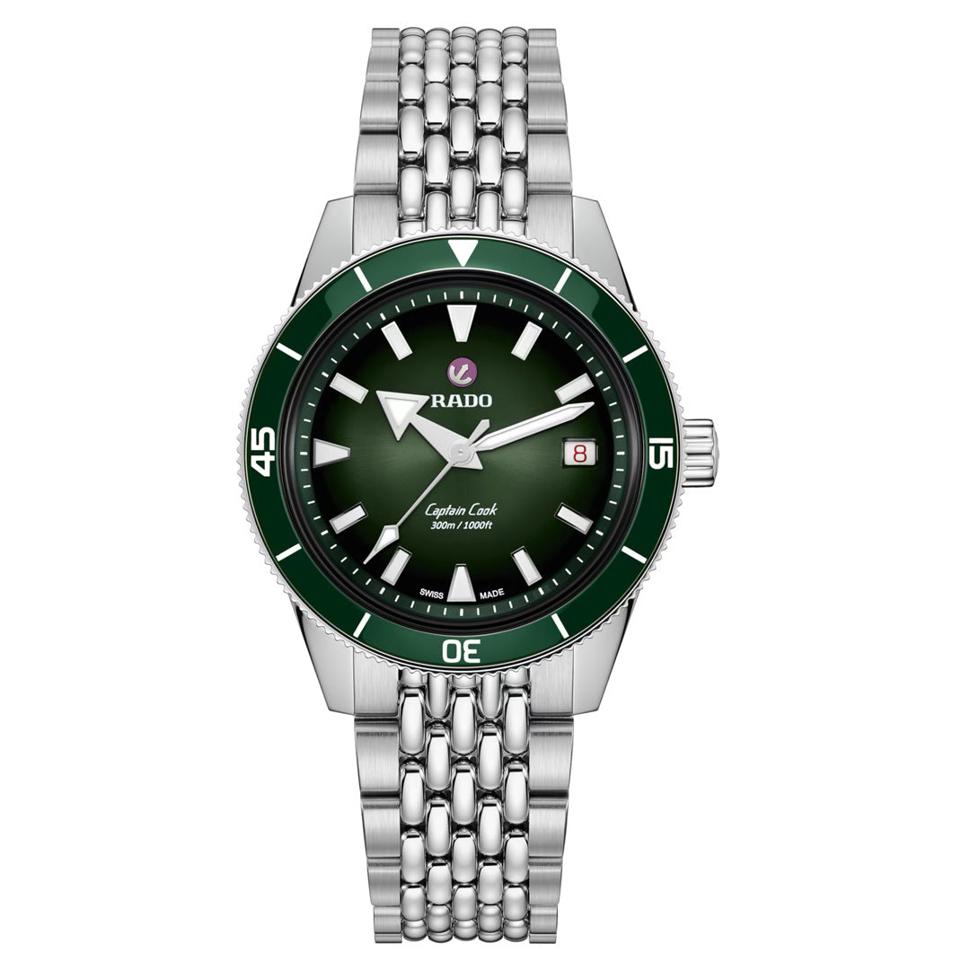 Introducing the RADO Captain Cook Automatic 39mm Watch by RADO—a silver wristwatch showcasing a captivating green ceramic bezel, vibrant green dial, silver hour markers, and a date window at 3 o’clock. Finished with a stainless steel bracelet, this timeless timepiece offers precision and reliability through its automatic movement.