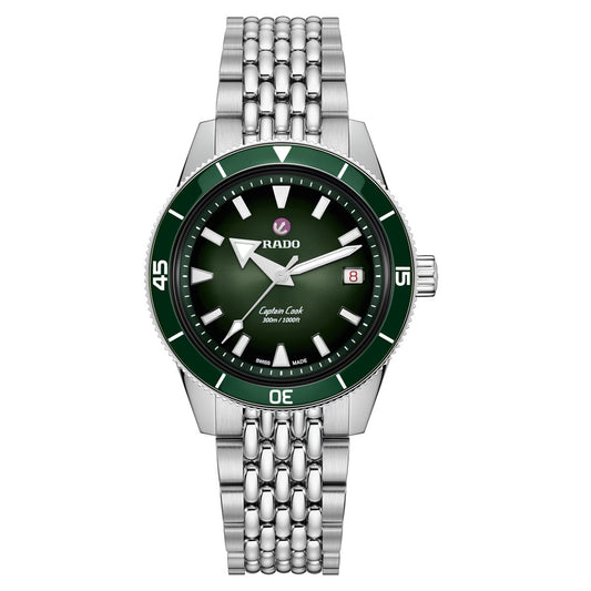 Introducing the RADO Captain Cook Automatic 39mm Watch by RADO—a silver wristwatch showcasing a captivating green ceramic bezel, vibrant green dial, silver hour markers, and a date window at 3 o’clock. Finished with a stainless steel bracelet, this timeless timepiece offers precision and reliability through its automatic movement.