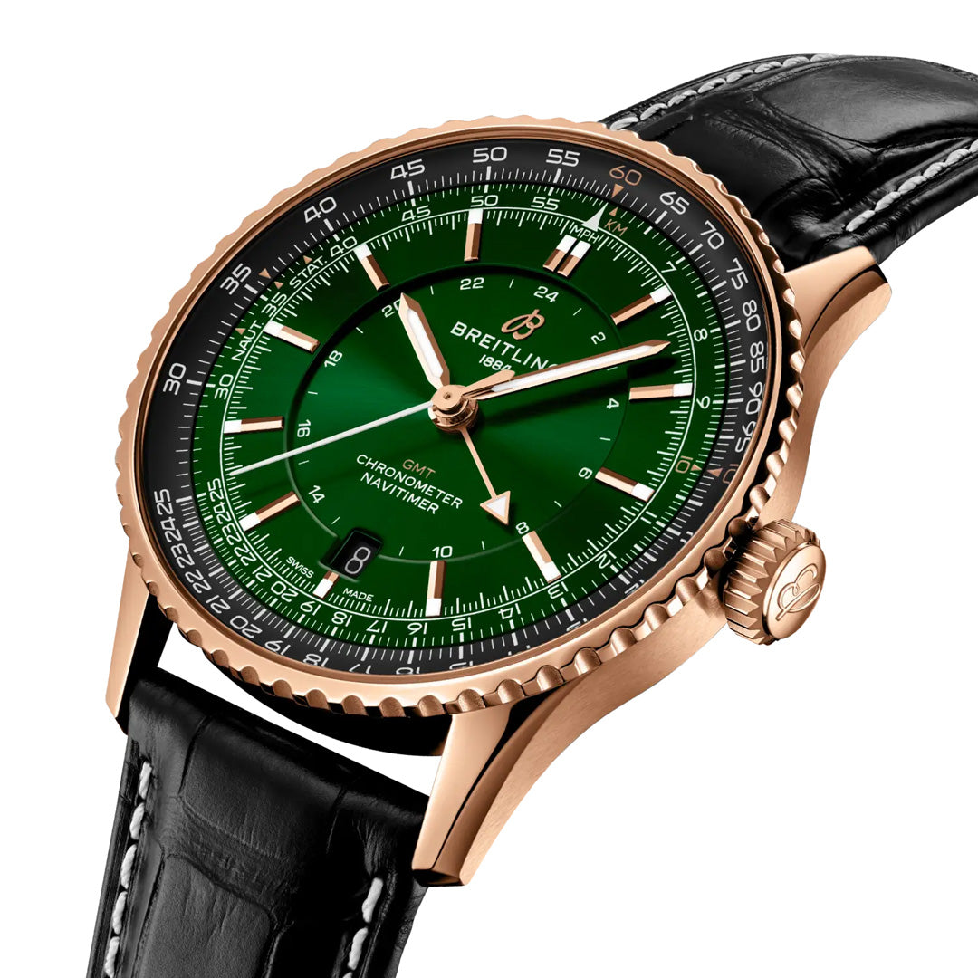 Introducing the BREITLING Navitimer Automatic GMT 41 by Breitling—a luxury wristwatch boasting a striking green dial, elegant rose gold bezel, and a sophisticated black leather strap. Featuring multiple time indicators and crisp white markings, this distinguished automatic GMT timepiece is an exceptional choice for discerning collectors.