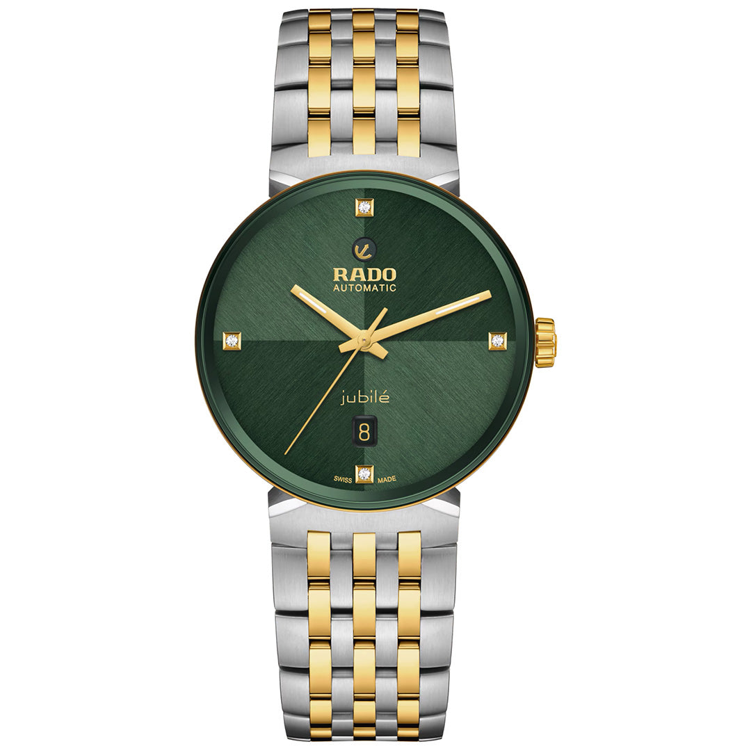 The RADO Florence Automatic 39mm Watch features a green dial with gold hour markers and a silver and gold metal bracelet. Crafted by RADO, this Swiss automatic timepiece includes a sapphire crystal, date display, and showcases a sleek, modern design.