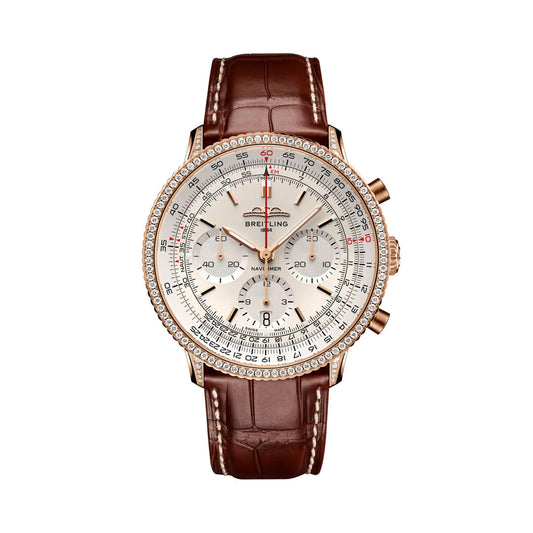 Introducing the BREITLING Navitimer B01 Chronograph 41 by Breitling—a luxurious aviation watch featuring a brown leather strap, gold case, diamond bezel, silver dial with multiple subdials, and a distinctive red-tipped second hand. This exquisite pilot’s chronograph is crafted for those who value precision and timeless style.