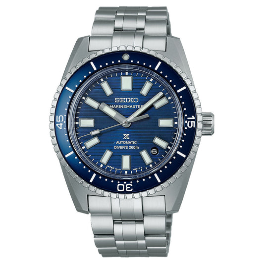 The Seiko Prospex Marinemaster Automatic With Manual Winding 39.5mm Watch features a silver metal bracelet and a blue dial with large luminous markers. It is powered by the Caliber 6L37, offering an automatic movement indicator and water resistance up to 200 meters, indicated by "Diver's 200m" on the face.