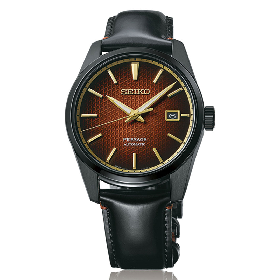 The Seiko Presage Sharp Edged Series Kabuki-Inspired Automatic 39mm watch, limited to 2,000 pieces, features a black leather strap, black case, textured reddish-brown dial with gold markers and hands, plus a date window at 3 o’clock.