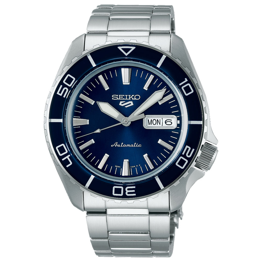 The Seiko 5 Sports SKX Series Automatic 42.5mm Watch by Seiko showcases a blue dial and bezel, complete with day and date display. Its bold hour markers and stainless steel bracelet offer style and functionality, including water resistance for everyday adventures.