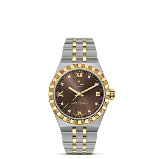 The TUDOR Royal is a luxury wristwatch featuring a brown dial with gold Roman numerals, ridged gold bezel, and two-tone silver and gold bracelet—a sport-chic automatic timepiece showcasing TUDOR's renowned quality.