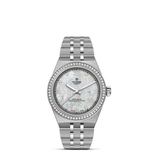 The TUDOR Royal by TUDOR is a silver wristwatch with an integrated stainless steel bracelet, diamond-set bezel, and a white mother-of-pearl dial with silver markers and hands.