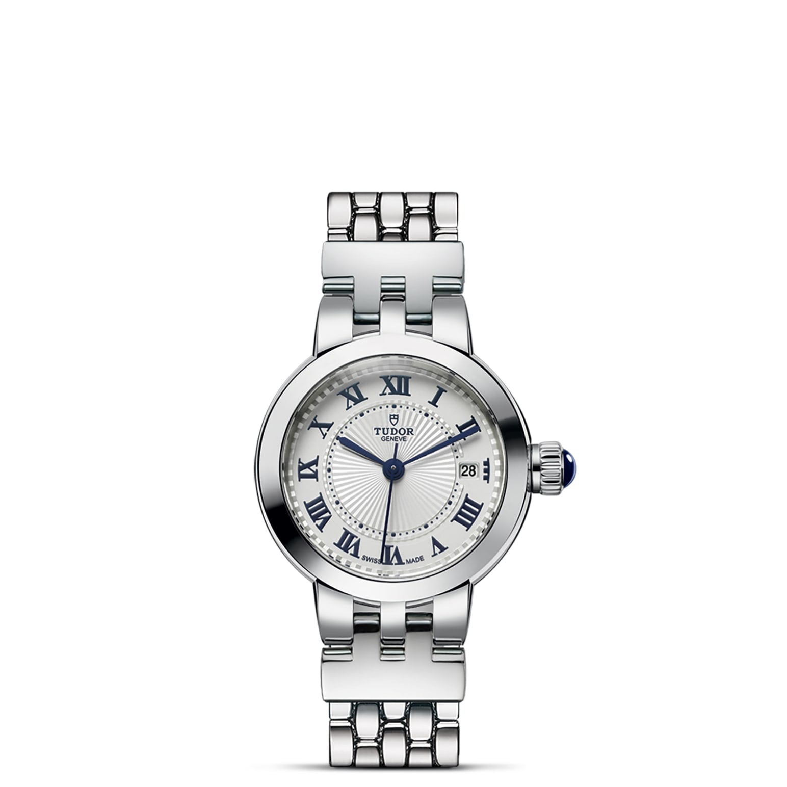The TUDOR Clair de Rose is a silver wristwatch with a round opaline dial, blue lacquered Roman numerals, date window at 3 o'clock, blue hands, metal link bracelet, and a crown with a striking blue accent.