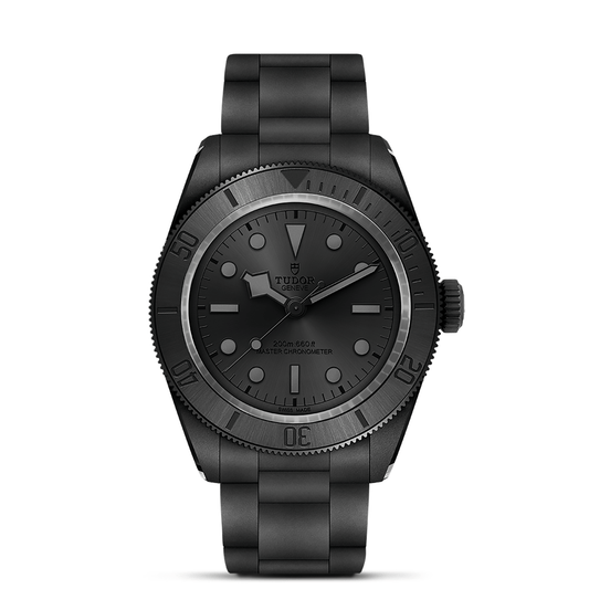 The TUDOR Black Bay Ceramic, a matte black watch with a black band, dial, and bezel plus subtle hour markers and hands, is photographed against a white background.