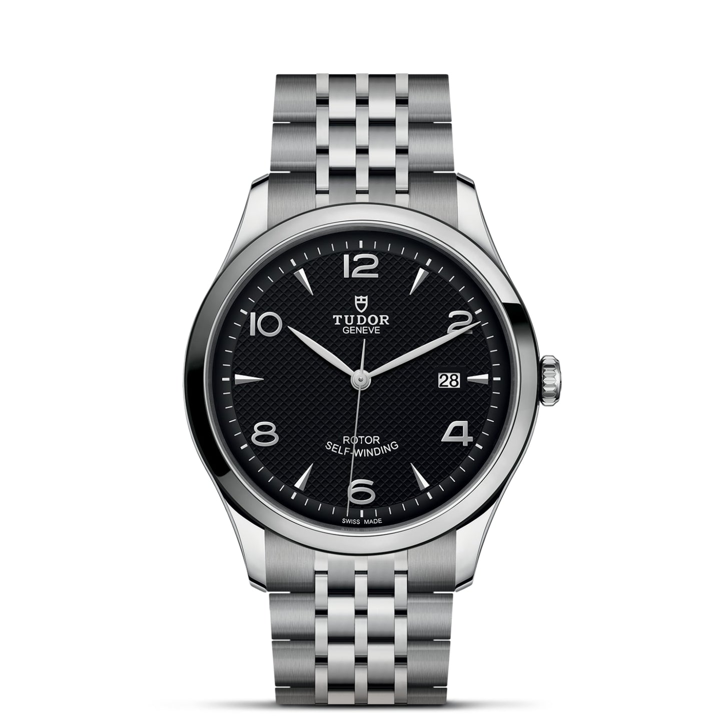 The TUDOR 1926 by TUDOR features a black textured dial, silver hour markers, date display at 3 o’clock, and a stainless steel bracelet—a timelessly elegant mechanical wristwatch.