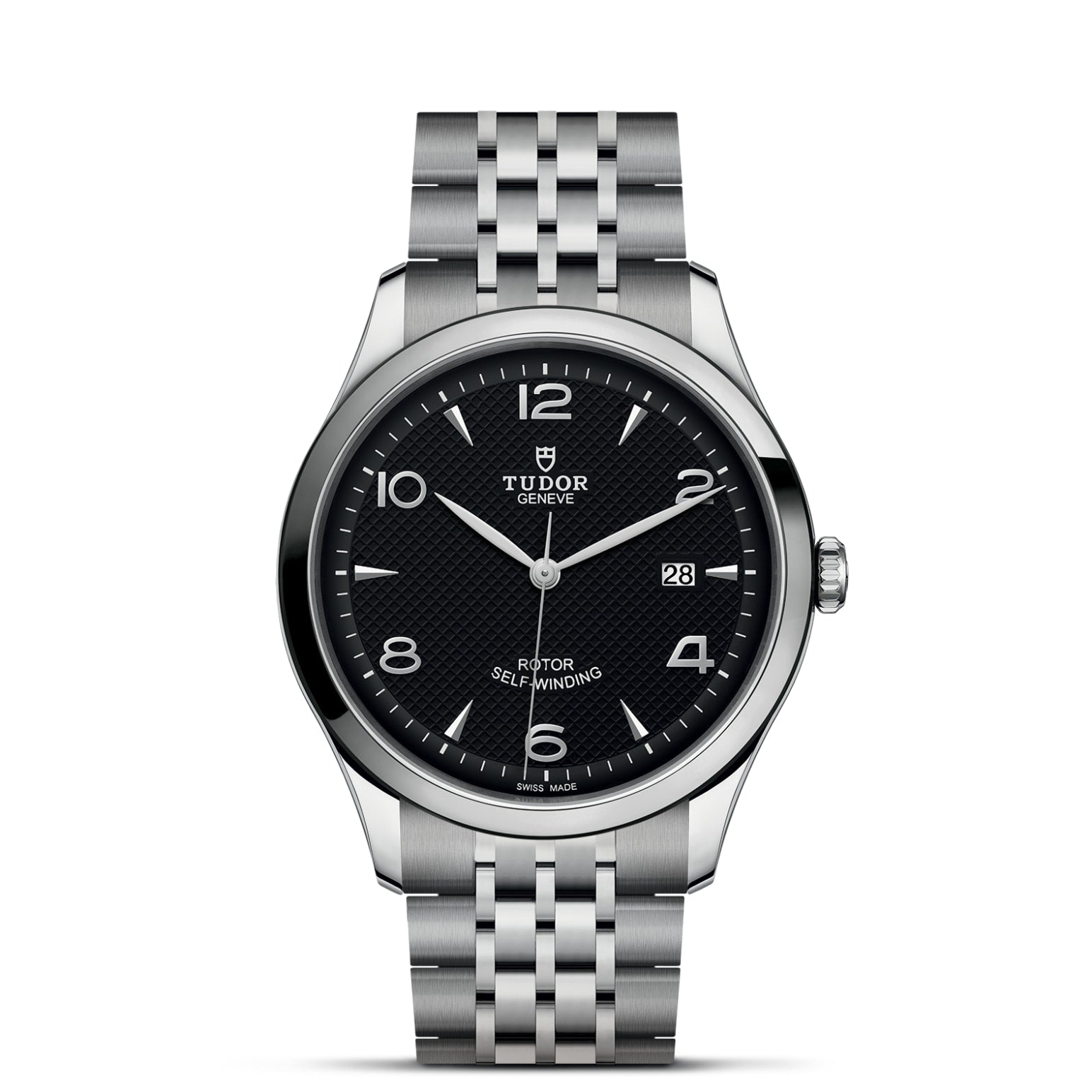 The TUDOR 1926 by TUDOR features a black textured dial, silver hour markers, date display at 3 o’clock, and a stainless steel bracelet—a timelessly elegant mechanical wristwatch.
