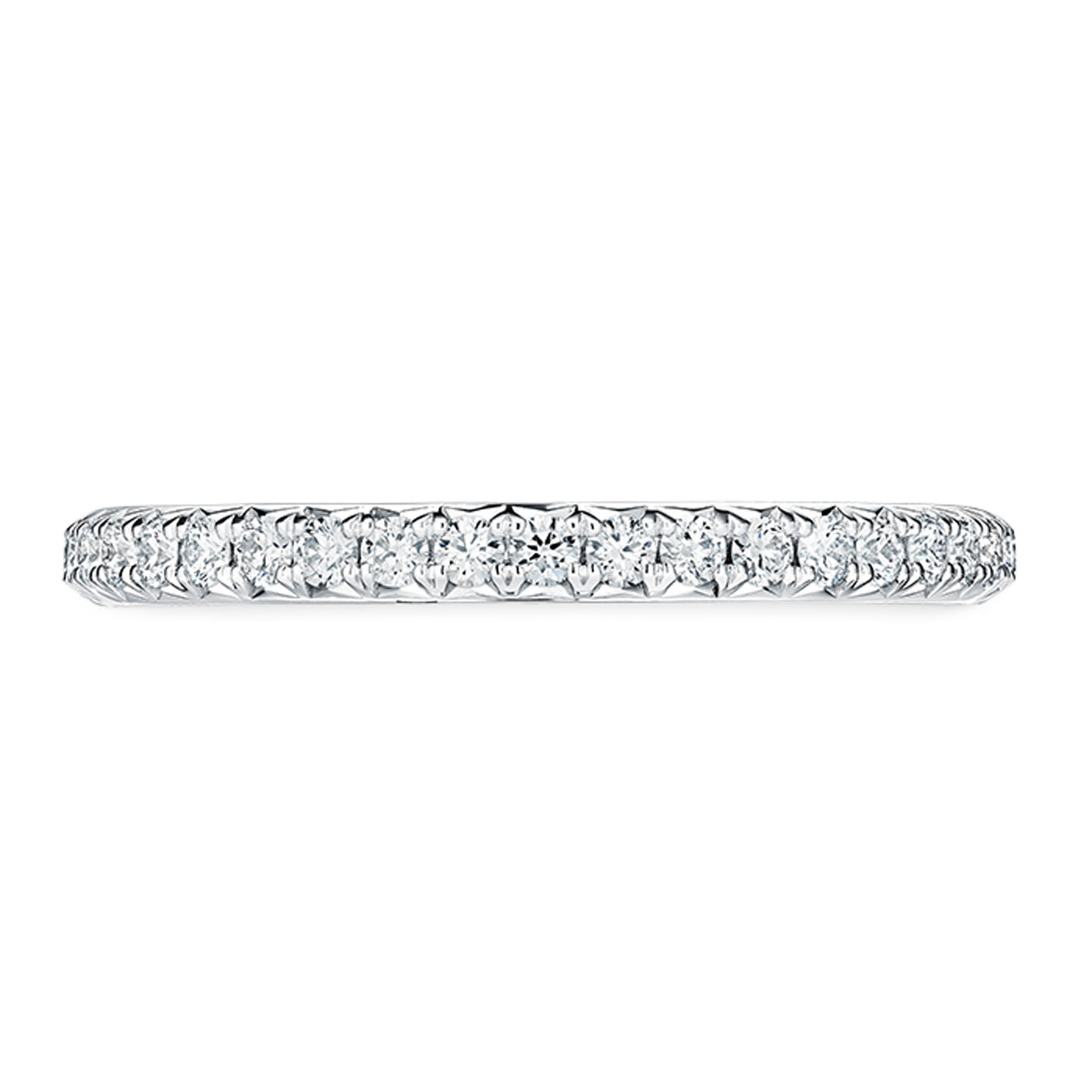 The Hearts On Fire Vela Platinum Round Brilliant Diamond Anniversary Ring is a delicate and refined band adorned with small round diamonds, forming a seamless sparkle.