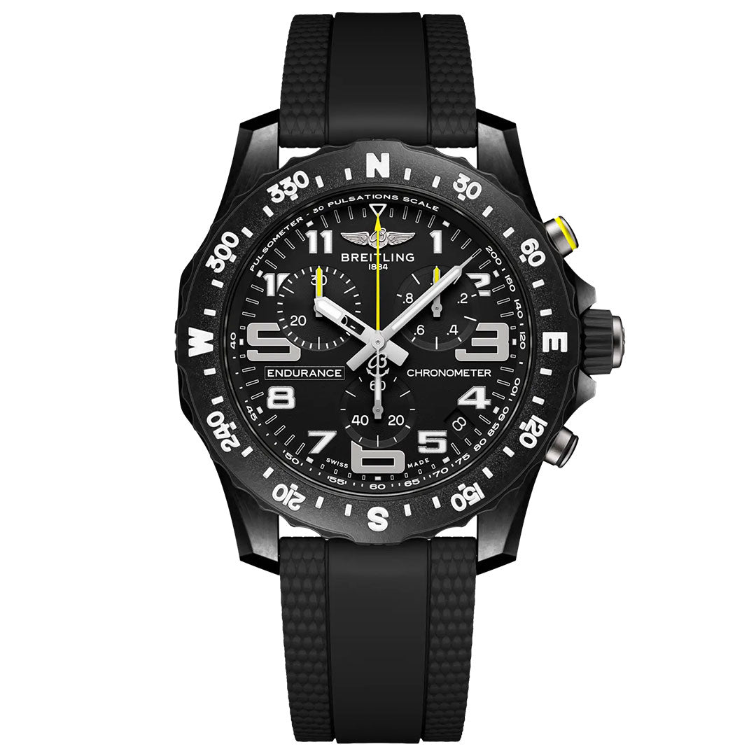 The BREITLING Endurance Pro 44 is a black chronograph by Breitling featuring a durable Breitlight case, black rubber strap, white numerals, subdials, and hands, with yellow accents on the crown and chronograph hand.