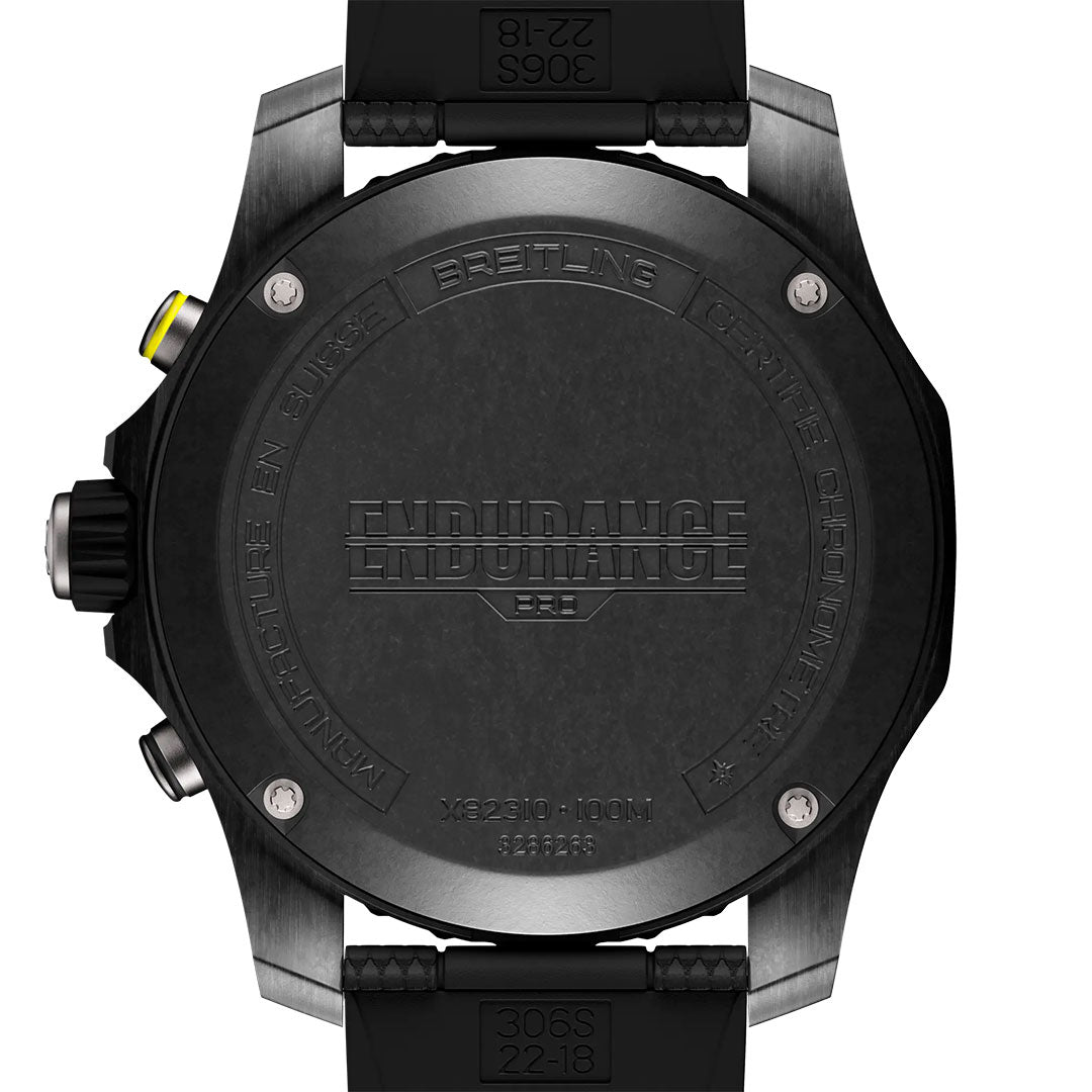 Back view of the BREITLING Endurance Pro 44 features an engraved black Breitlight case back with “ENDURANCE” branding and technical details. The black strap and side pushers complete this dynamic Breitling athleisure watch.
