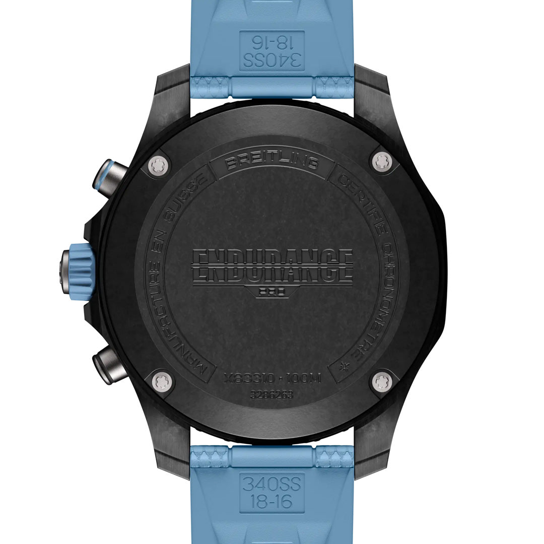 The back view of the BREITLING Endurance Pro 38 wristwatch features an ultra-light Breitlight® case with a light blue strap. This sports chronograph, engraved with "Endurance," showcases side buttons for enhanced performance appeal.