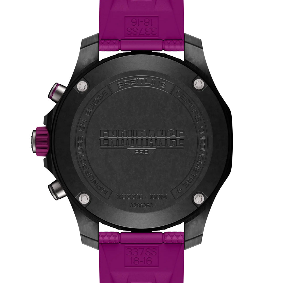 Close-up of the black back of a BREITLING Endurance Pro 38 with engraved "Breitling," surrounded by purple straps. This athleisure watch features side buttons made from durable Breitlight® material.